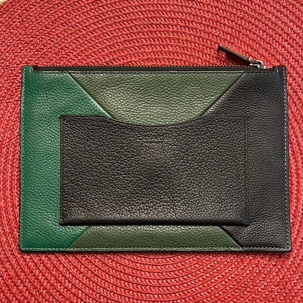 Coach green and black patch envelope bag.